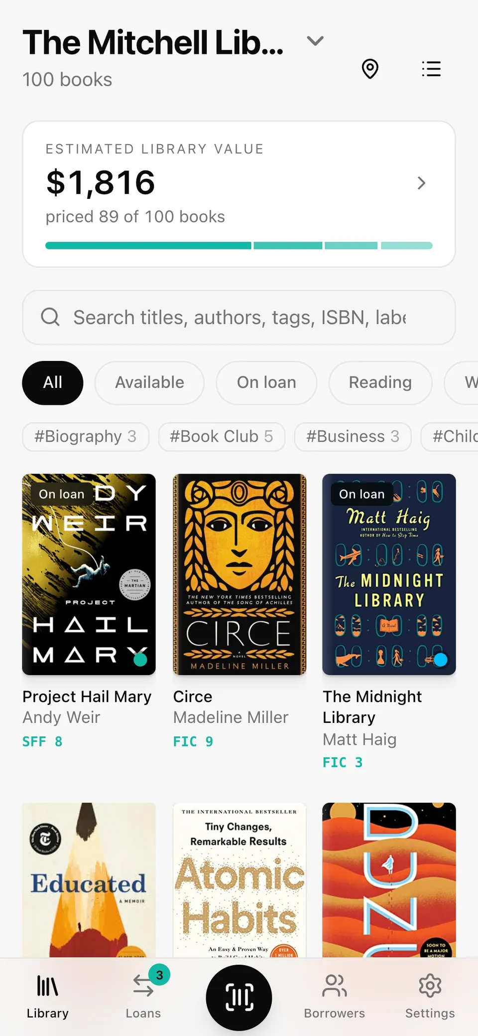 The same library on a phone: covers in a grid with shelf labels like FIC 9 and SFF 8.