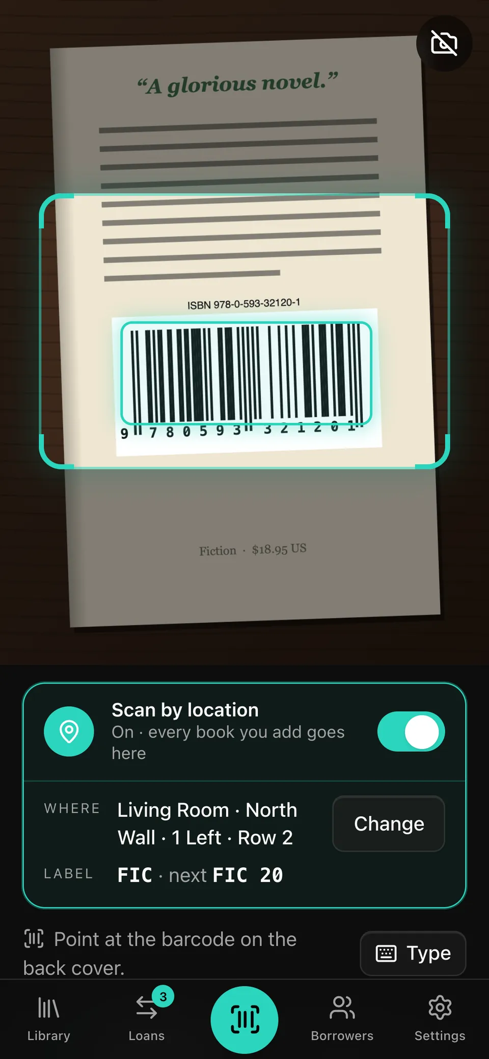The camera view locking onto a book's barcode, outlined in teal.