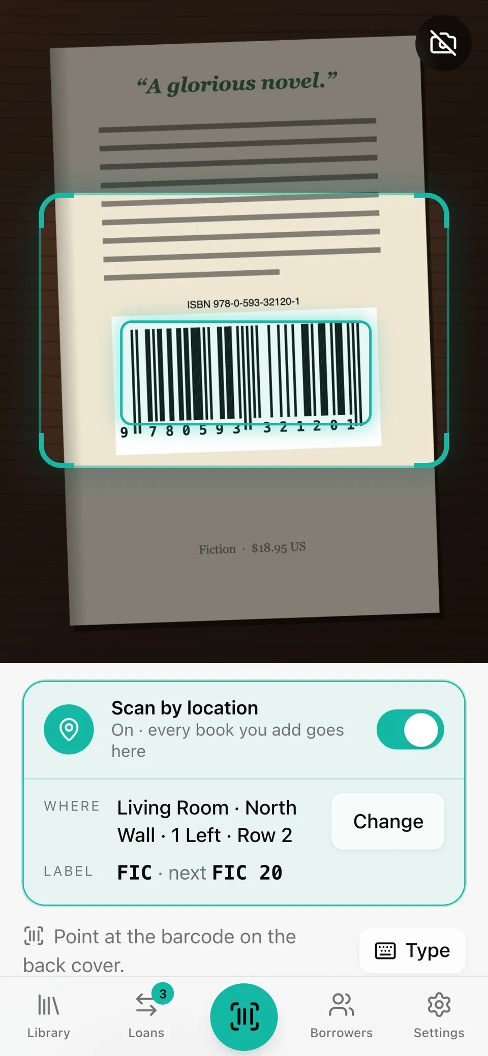 The camera view locking onto a book's barcode, outlined in teal.