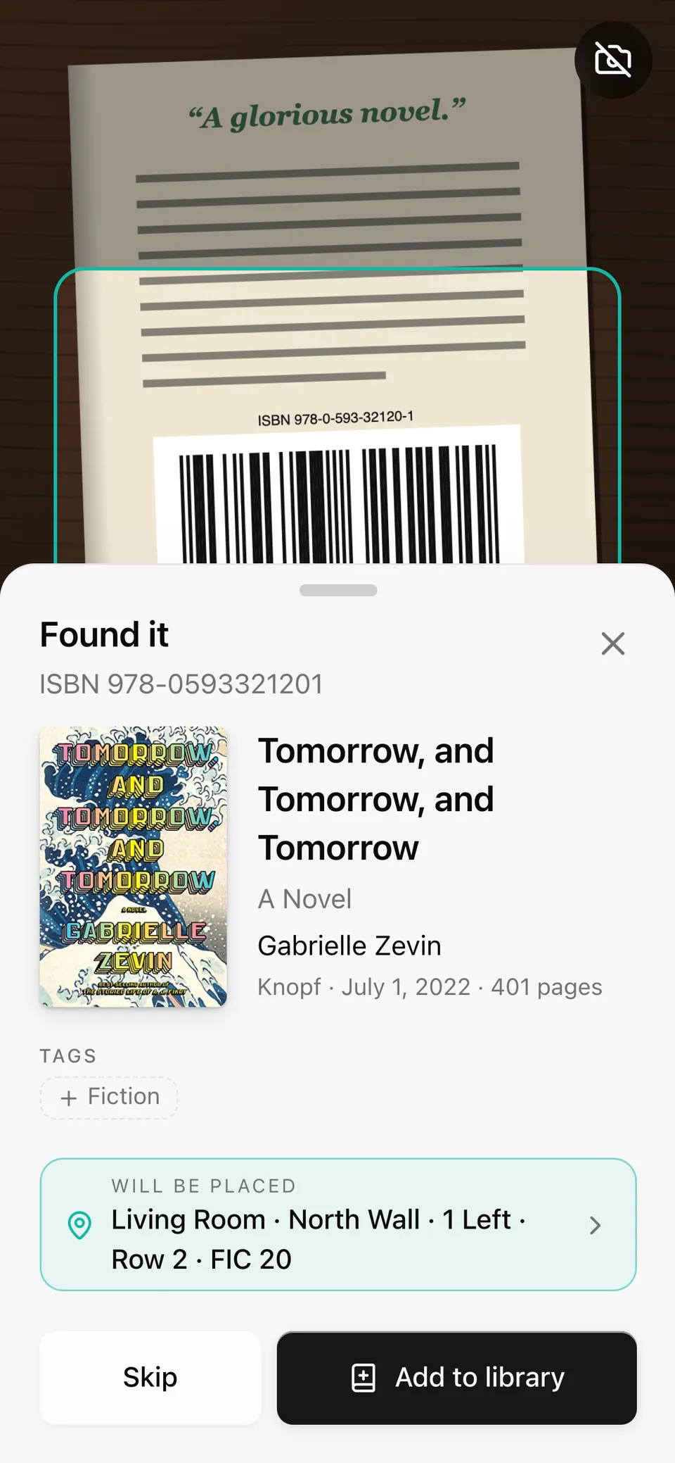 Scanning on a phone: the barcode was read and the book was found, ready to add to the Living Room shelf with label FIC 20.